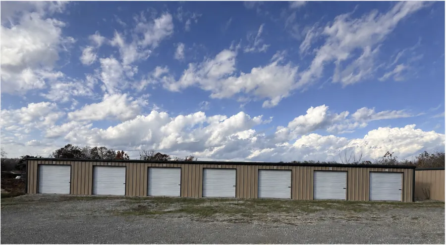 Storage building with seven roll-up doors at Spearhead Storage in Gamaliel, AR